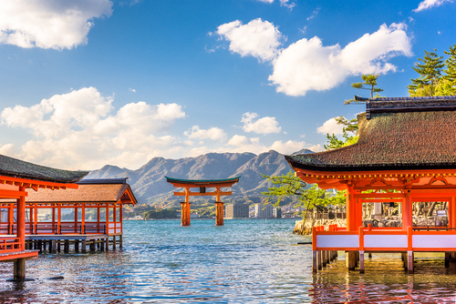 Experience remarkable Japanese sights like these red-hued shrines on water when you take a tailor-made holiday with Alfred&.