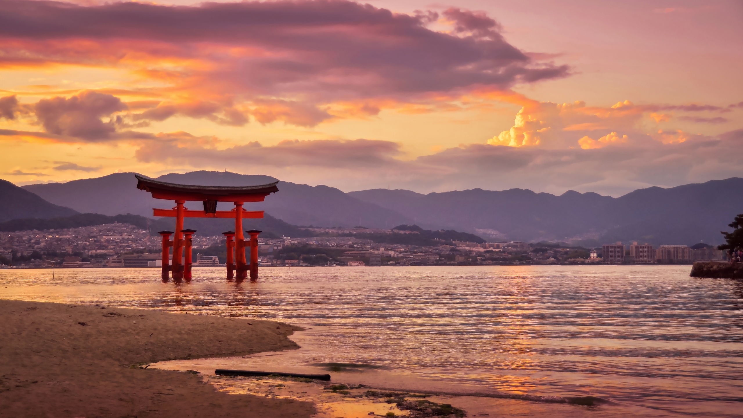 Experience attractive Japanese sights like this vermillion torii gate in Miyajima when you take a tailor-made holiday with Alfred&.