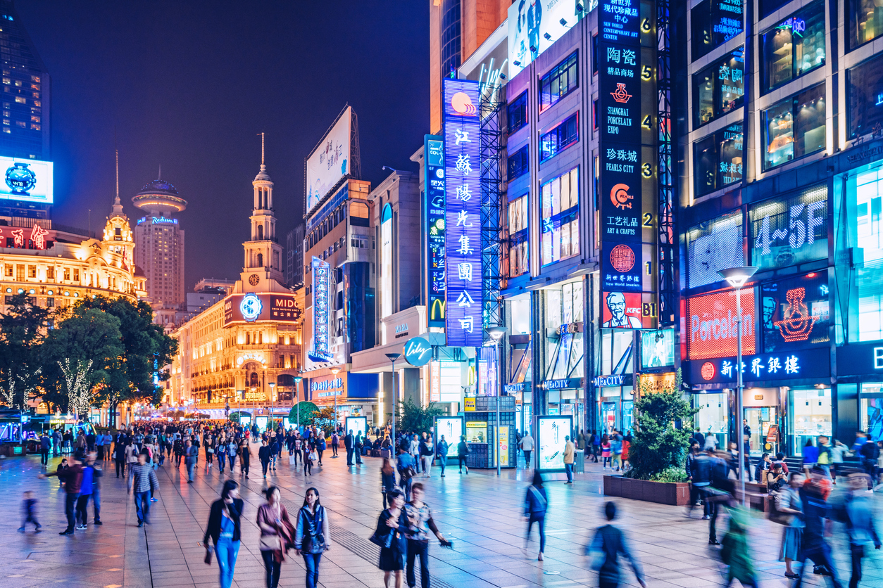 Experience extraordinary cityscapes such as this brightly lit Shanghai shopping street when you take a tailor-made holiday with Alfred&.