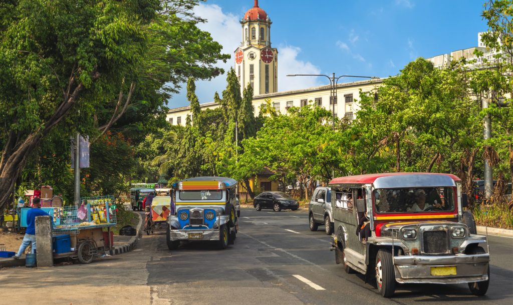 Experience remarkable Philippine sights like these colourful jeepneys in Manila when you take a tailor-made holiday with Alfred&.