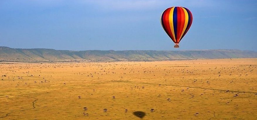 Experience remarkable Kenya sights like this view of the Maasai Mara from a hot air balloon when you take a tailor-made holiday with Alfred&.
