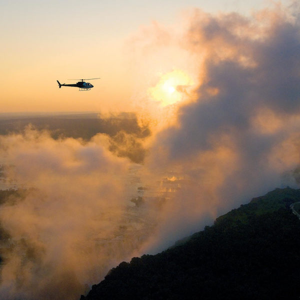 Flying high in a helicopter over Victoria Falls