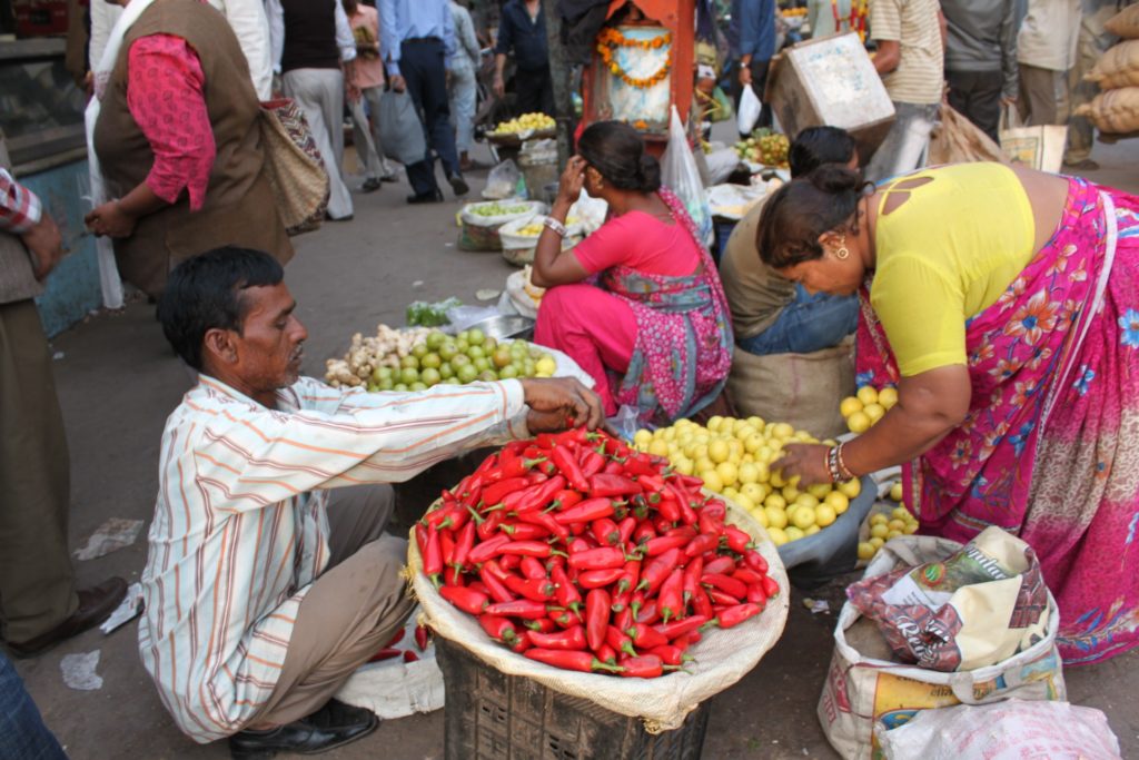 Experience authentic Indian sights like this vegetable market in Delhi when you take a tailor-made holiday with Alfred&.