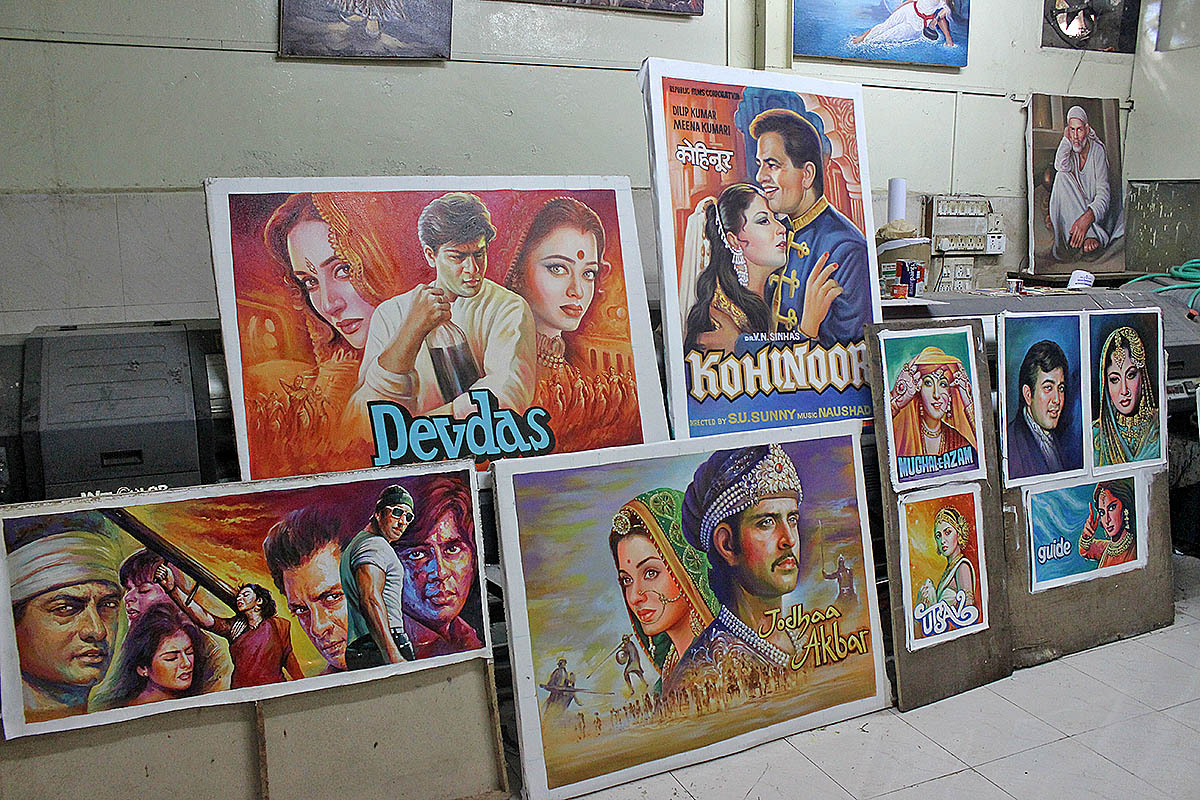 Experience authentic Indian culture like in this Mumbai shop selling Bollywood posters when you take a tailor-made holiday with Alfred&.