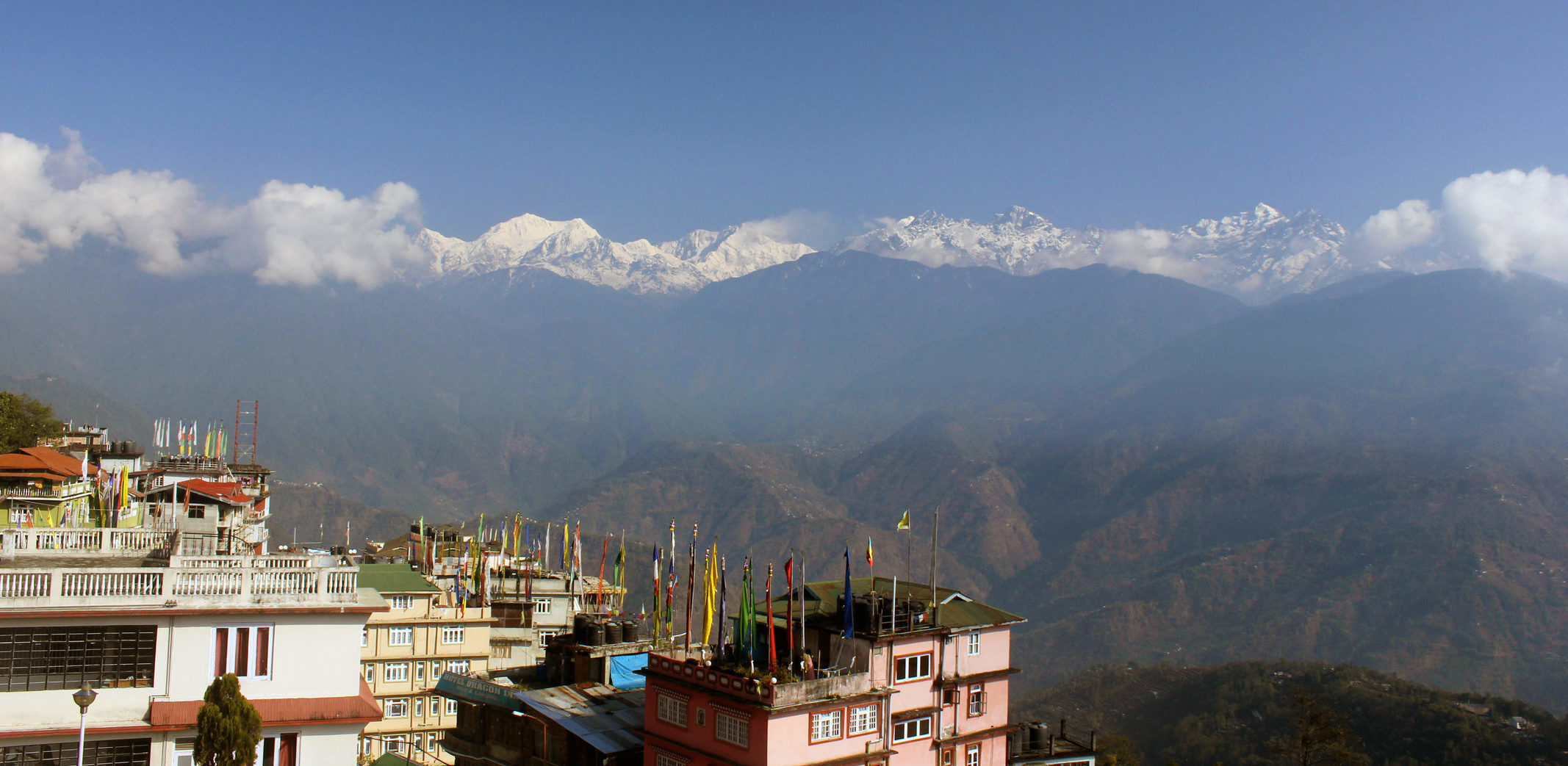 Experience extraordinary Indian landscapes like these teetering Kanchenjunga mountains when you take a tailor-made holiday to Pelling with Alfred&.