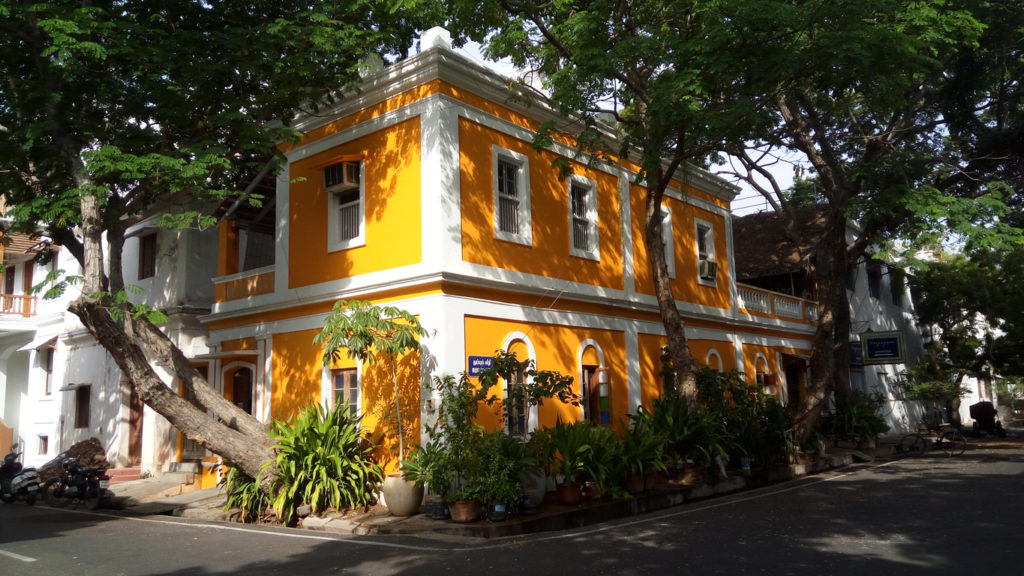 Experience French-style architecture like this canary-yellow building in Pondicherry, India when you take a tailor-made holiday with Alfred&.