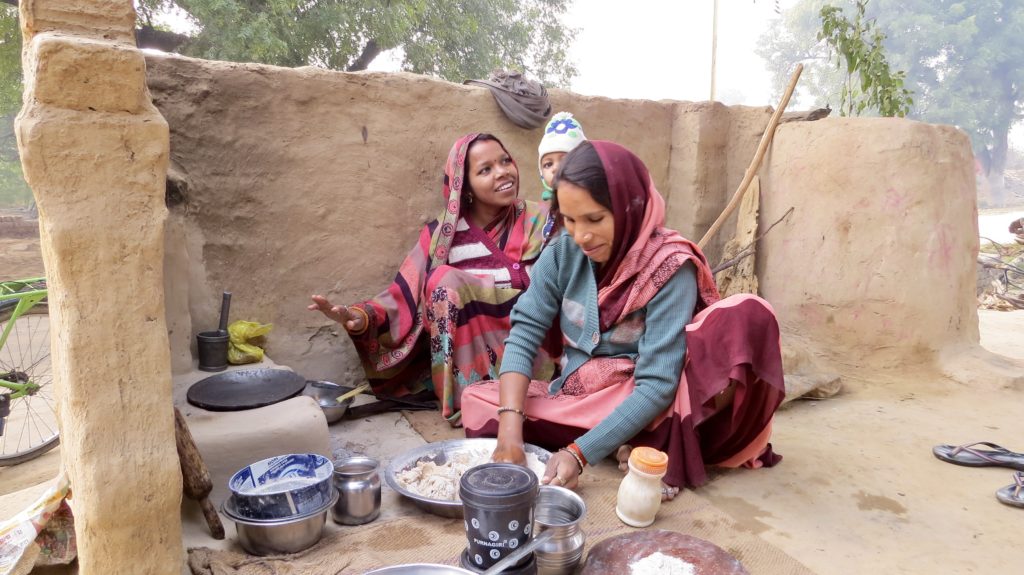Friendly local women in Agra making pakoras