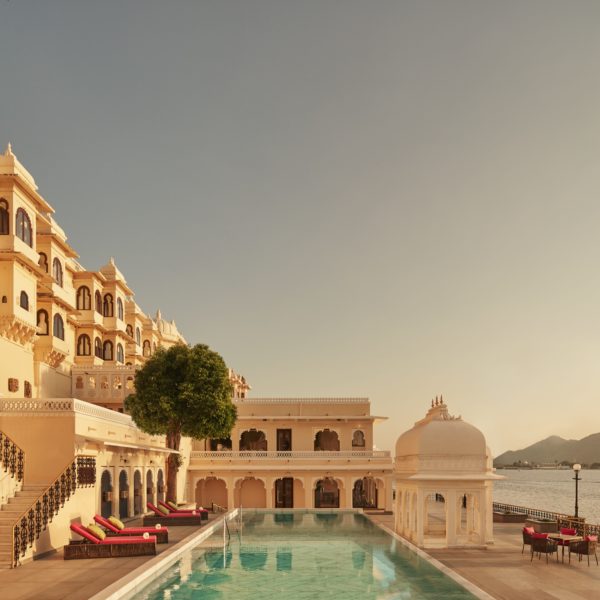 The gleaming exterior and swimming pool of the Taj Fateh Prakash Palace in Udaipur