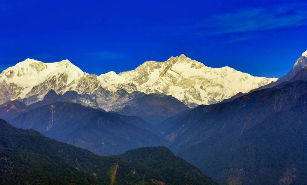 Discover remarkable Indian sights like this view of snow-capped Mount Kanchenjunga when you take a tailor-made holiday with Alfred&.