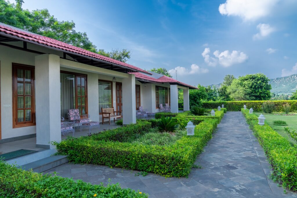 Stay in picturesque rural villas like these in Sariska Safari Lodge, India when you take a tailor-made trip with Alfred&