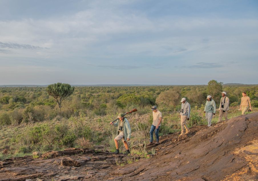 Immerse yourself into the bush like these explorers on a walking safari when you take a tailor-made holiday with Alfred&