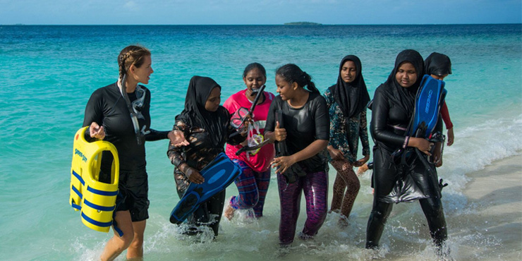 Young Maldivians enjoying using the donated snorkelling equipment