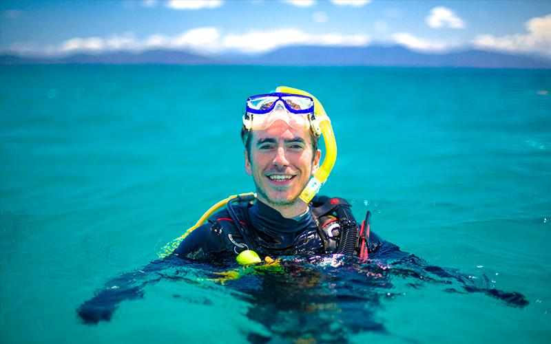 Simon Reeve diving on the Great Barrier Reef