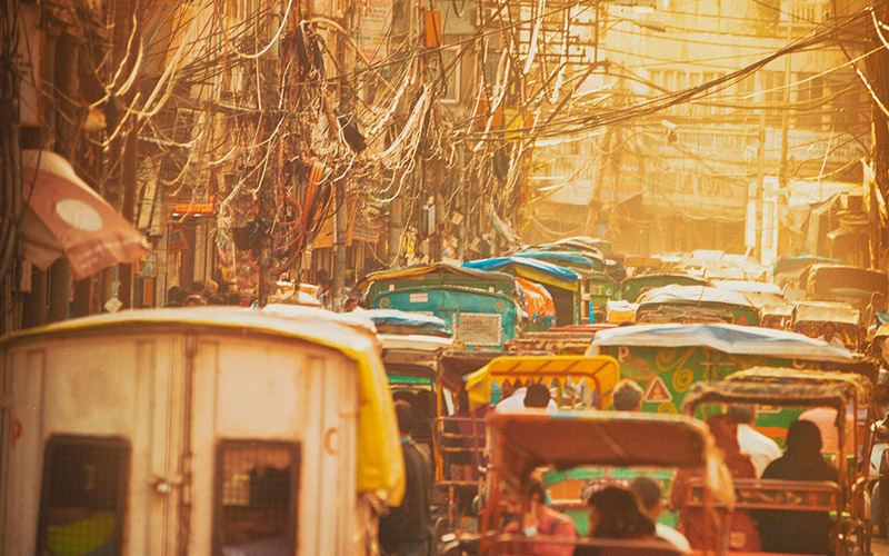 Sunset on a busy street in Old Delhi