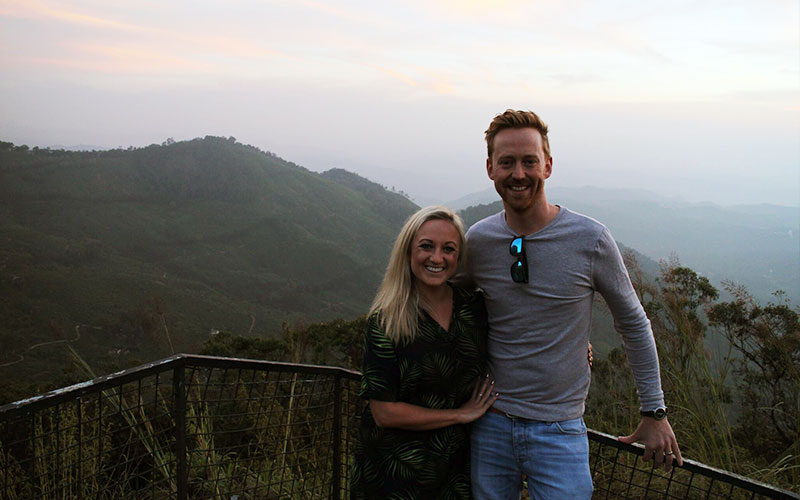 Alex Daniel and his wife, Laura, overlooking the hills of Kerala